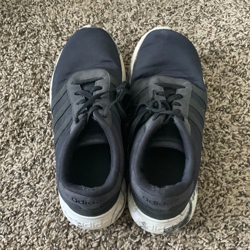 Shoes they are adidas and there black and white